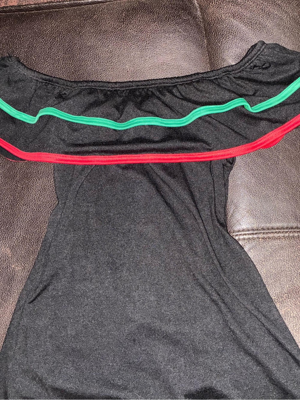Black Off-Shoulder One-Piece with Red and Green Trim